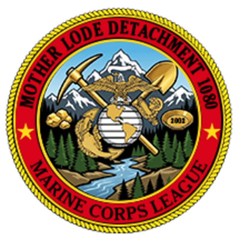 A circular emblem features a globe with an eagle, crossed shovel and pickaxe, and a river flowing through a forest in the foreground, set against a backdrop of snow-capped mountains.