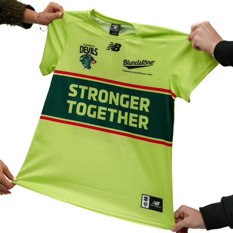 Four hands stretch a bright green t-shirt with "STRONGER TOGETHER" printed across it against a white background.
