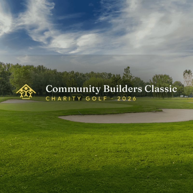 A lush green golf course with sand traps in the foreground is set against a backdrop of trees and a cloudy sky, with the text "Community Builders Classic CHARITY GOLF - 2026" overlaid.