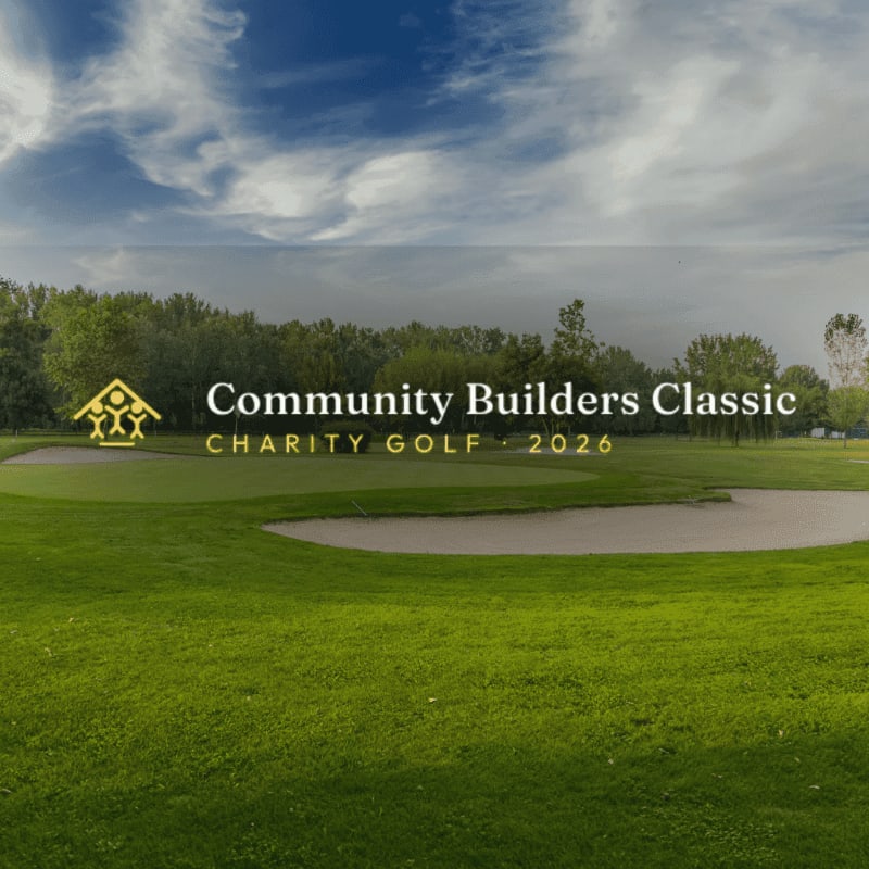 A lush green golf course with sand traps in the foreground is set against a backdrop of trees and a cloudy sky, with the text "Community Builders Classic CHARITY GOLF - 2026" overlaid.