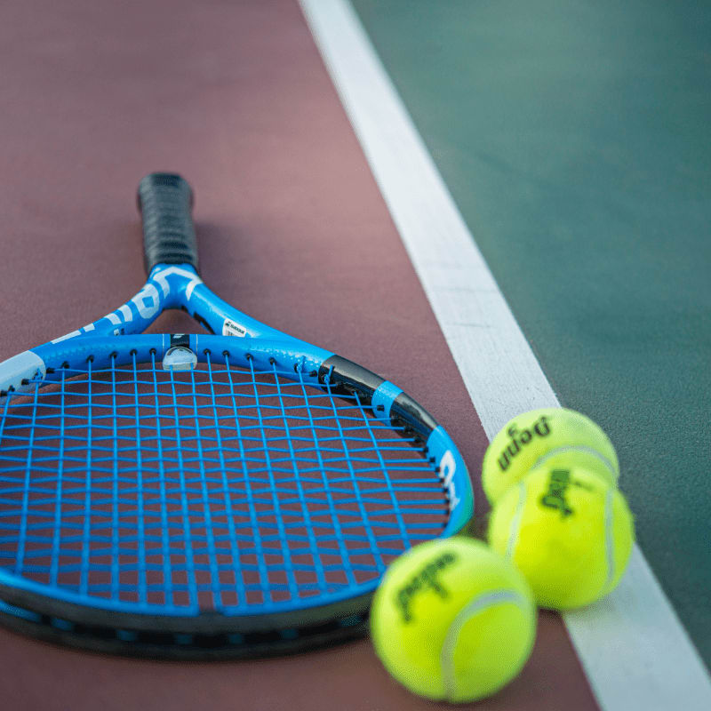 yellow and blue tennis racket