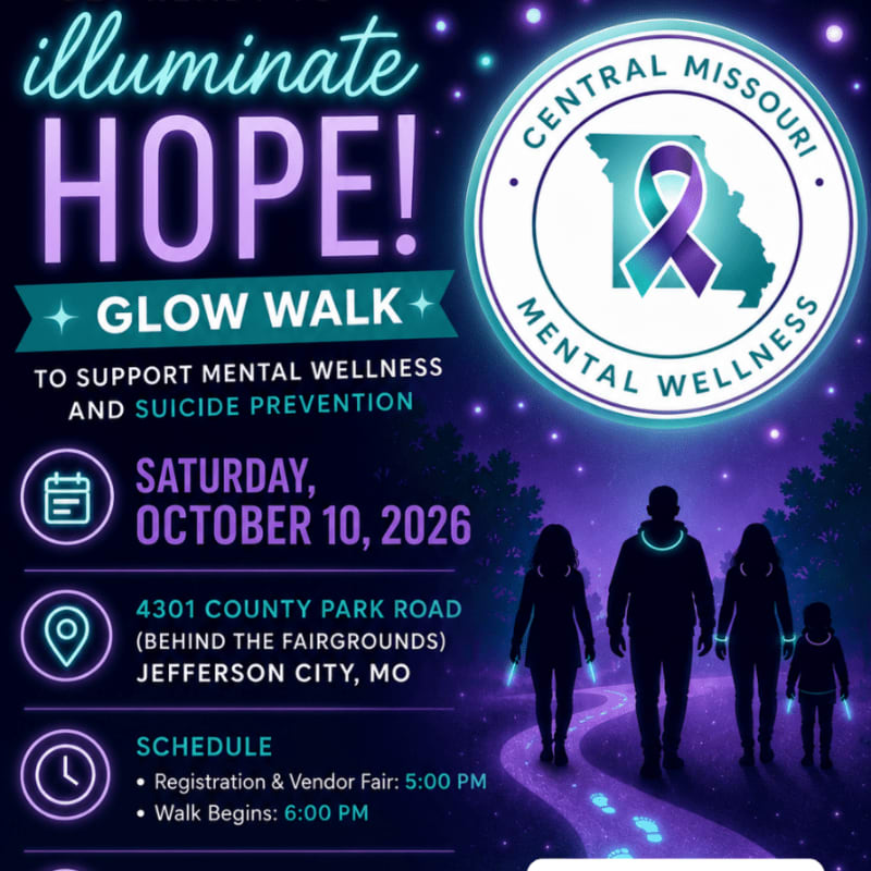 Silhouettes of people with glow sticks walk on a path in the foreground, while the background features text promoting a "Glow Walk" for mental wellness and suicide prevention.