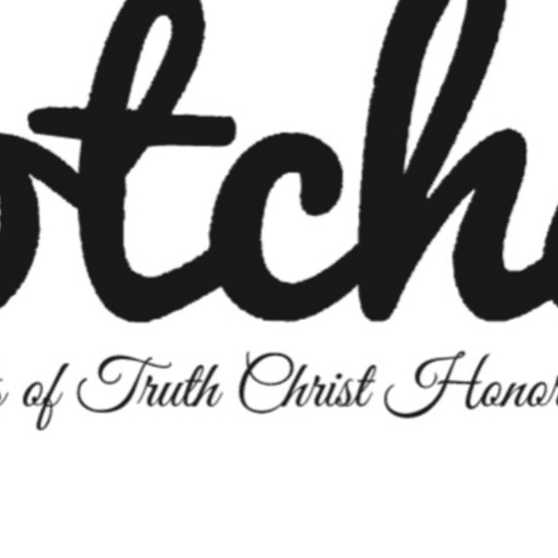 Black cursive text with a smaller script below it is set against a white background.