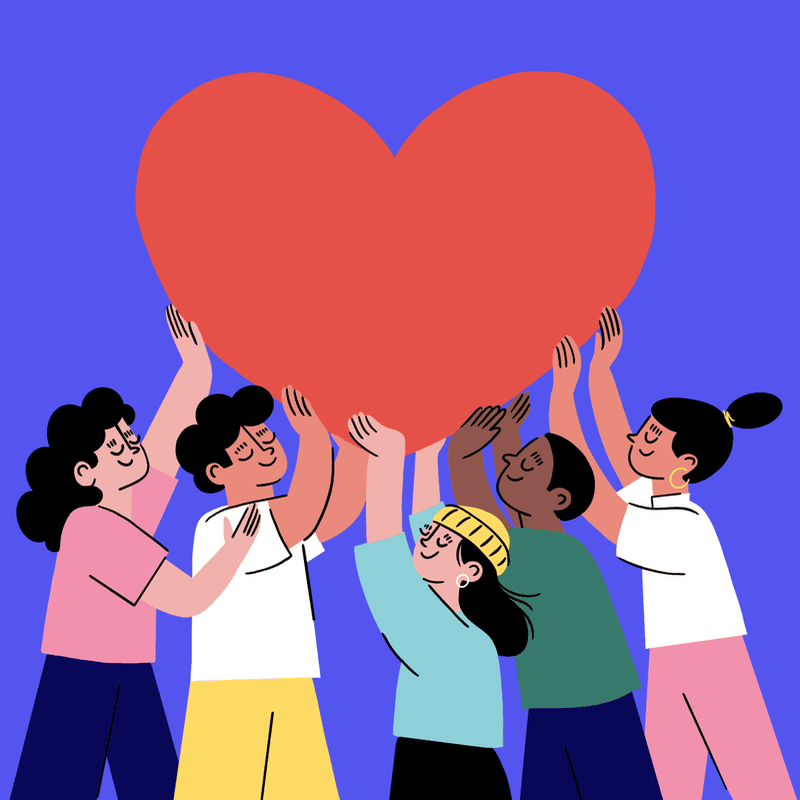 A diverse group of people in the foreground hold up a large red heart against a solid blue background.