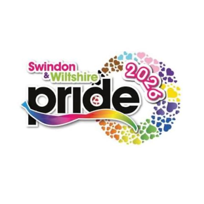 The foreground features the words "Swindon & Wiltshire pride" in bold lettering with a rainbow ribbon, while the background is a swirling infinity symbol made of colorful hearts, with "2026" prominently displayed.