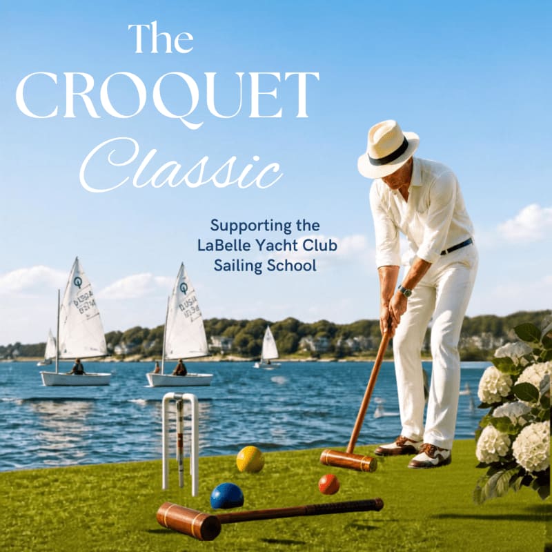 A man in a white suit plays croquet on a grassy lawn in the foreground, with sailboats on a blue lake and a clear sky in the background.
