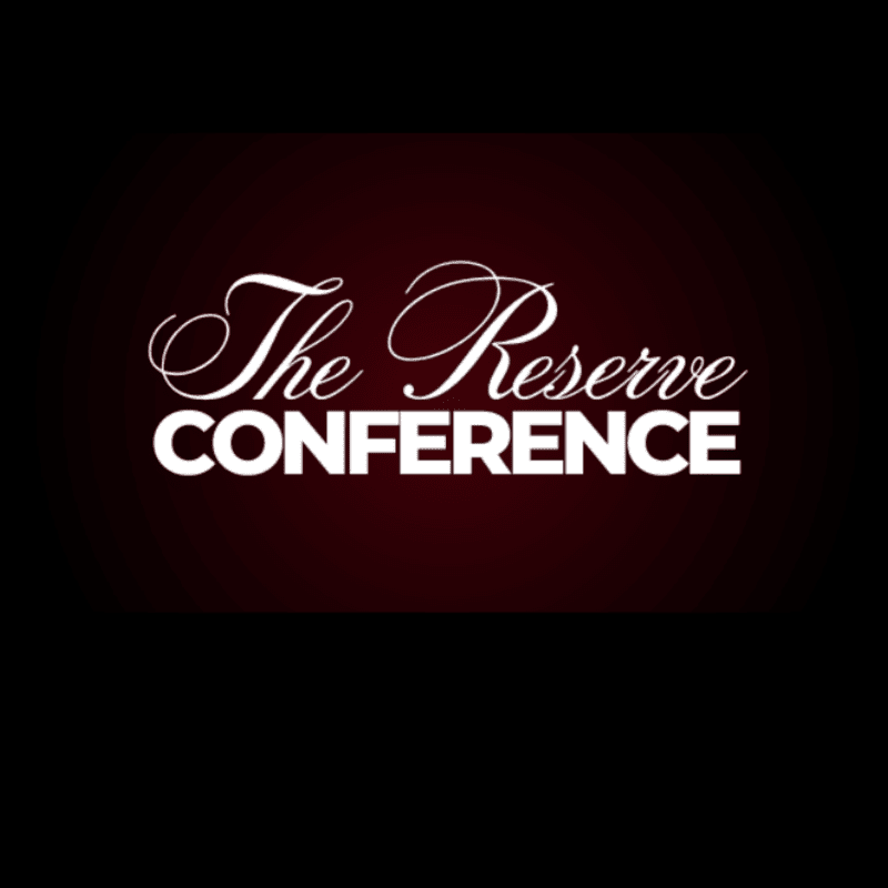 White text reading "The Reserve CONFERENCE" is displayed in the foreground against a dark red, gradient background.