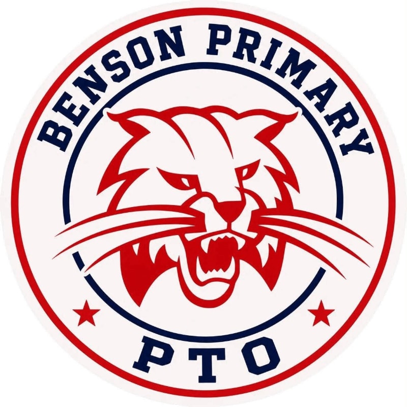 A fierce red and white bobcat with bared teeth is the central focus, set against a circular background with "BENSON PRIMARY PTO" written in blue lettering and two red stars.