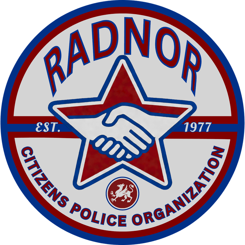 A circular logo with a red and blue border features a red star with a handshake in the foreground, and the words "RADNOR CITIZENS POLICE ORGANIZATION EST. 1977" in the background.