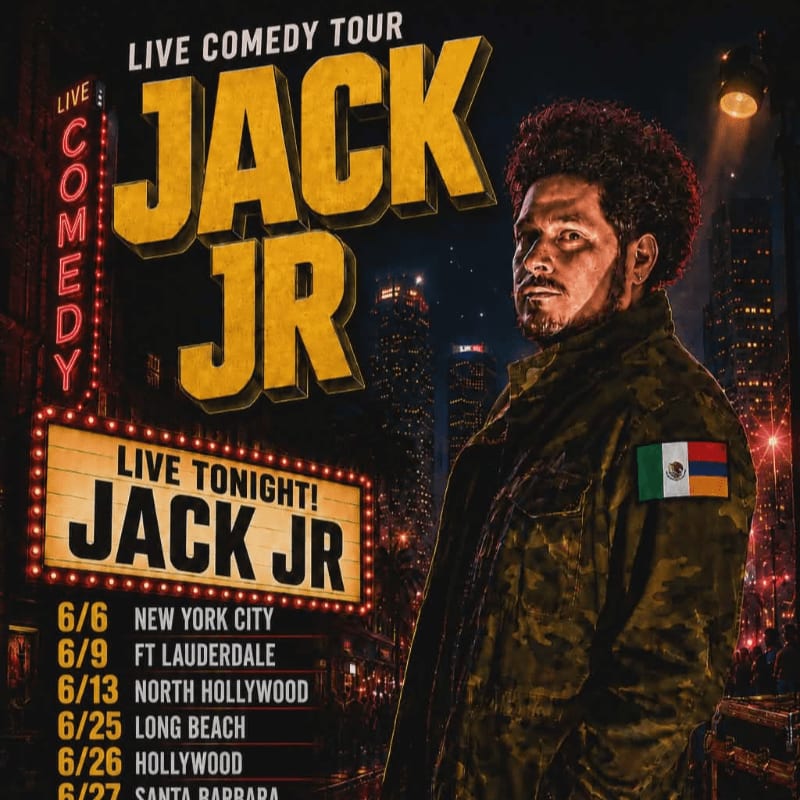 A man with a beard and curly hair stands in front of a city skyline at night, advertising a live comedy tour for "Jack Jr."