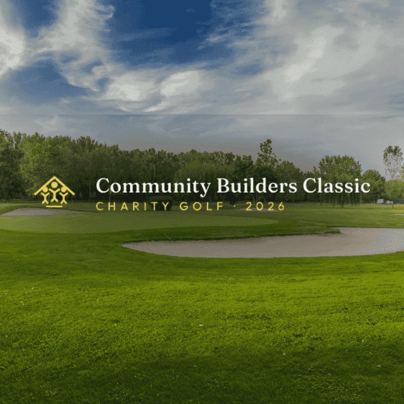 A lush green golf course with sand traps in the foreground is set against a backdrop of trees and a cloudy sky, with the text "Community Builders Classic CHARITY GOLF - 2026" overlaid.