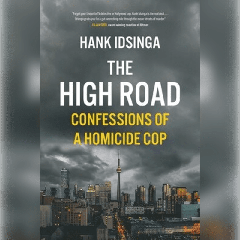 A book cover titled "The High Road: Confessions of a Homicide Cop" by Hank Idsinga is superimposed over a dramatic cityscape with a cloudy sky.