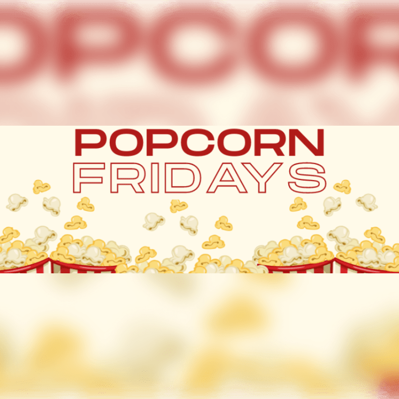 Two overflowing popcorn containers in the foreground are framed by the blurred word "POPCORN" in the background.