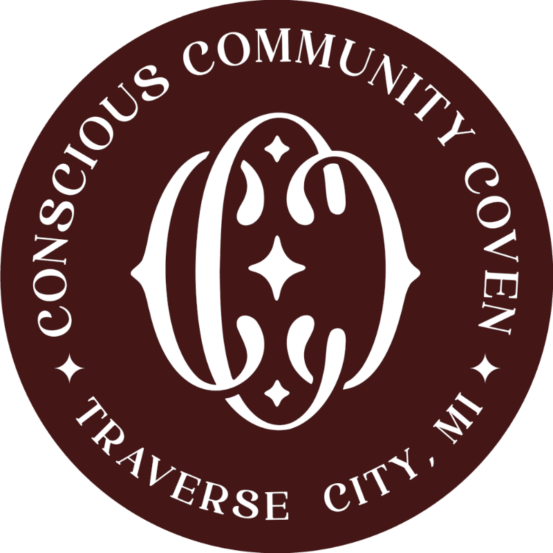 A white ornate monogram is centered on a dark red circular background with text around the perimeter.