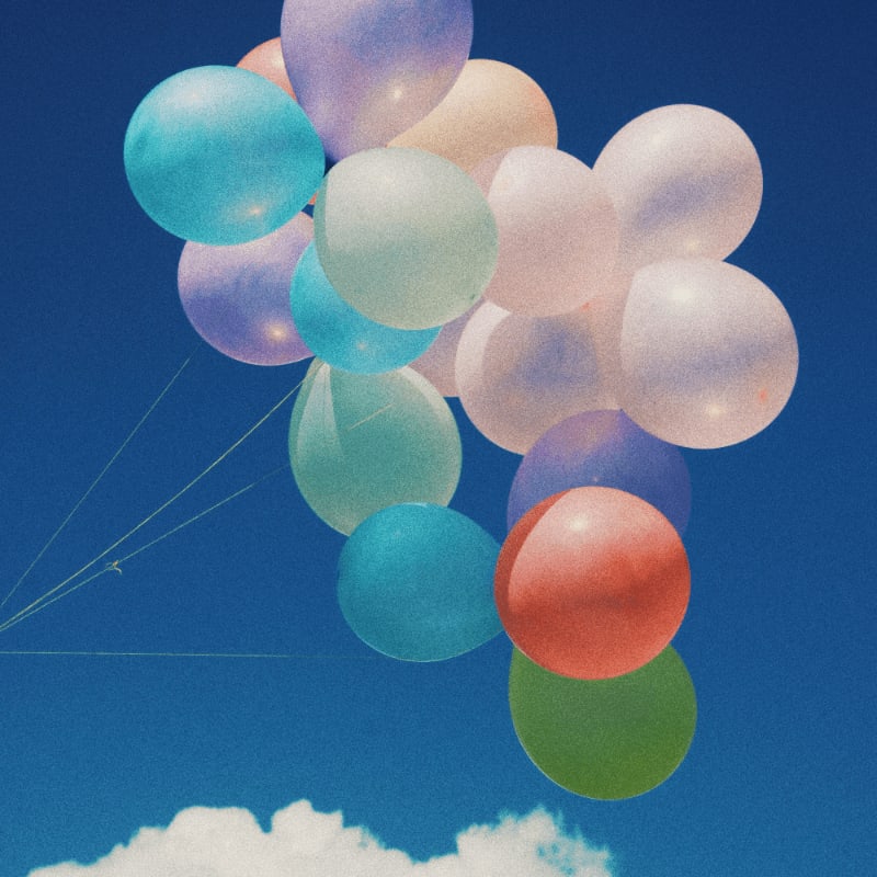 white, blue, and purple balloons