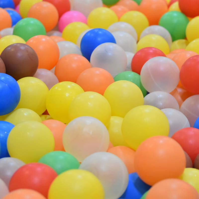 a bunch of balloons that are all different colors