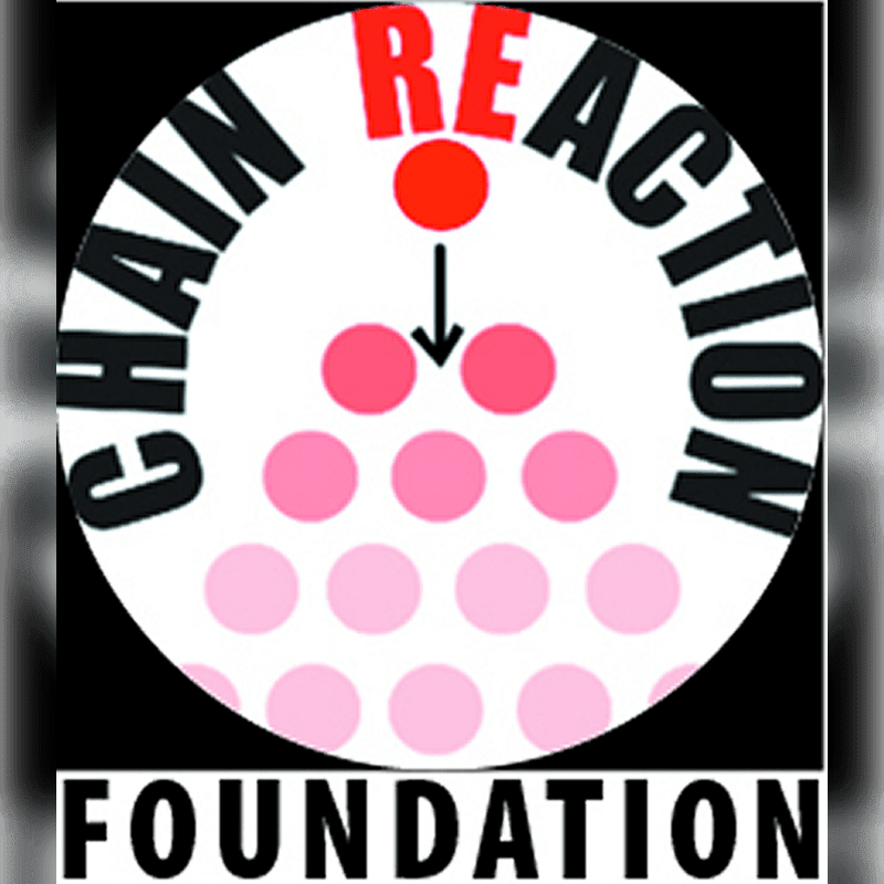 A red circle with an arrow pointing down at a pyramid of pink circles is in the foreground, with the words "CHAIN REACTION" curved around it, all set against a black background with "FOUNDATION" written below.