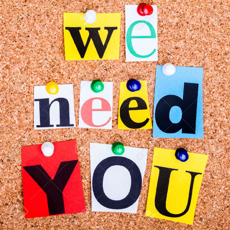 Cutout letters spelling "we need YOU" are pinned to a corkboard background.