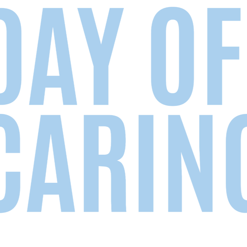 Large, light blue text reading "DAY OF CARING" is centered against a plain white background.
