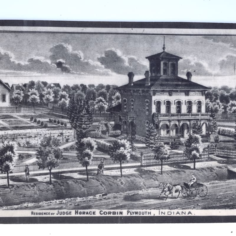 A horse-drawn carriage travels on a road in the foreground, while a large, ornate house with manicured gardens and trees fills the background.