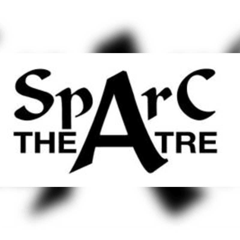 A black and white logo for "SpArc Theatre" is centered on a blurred background.