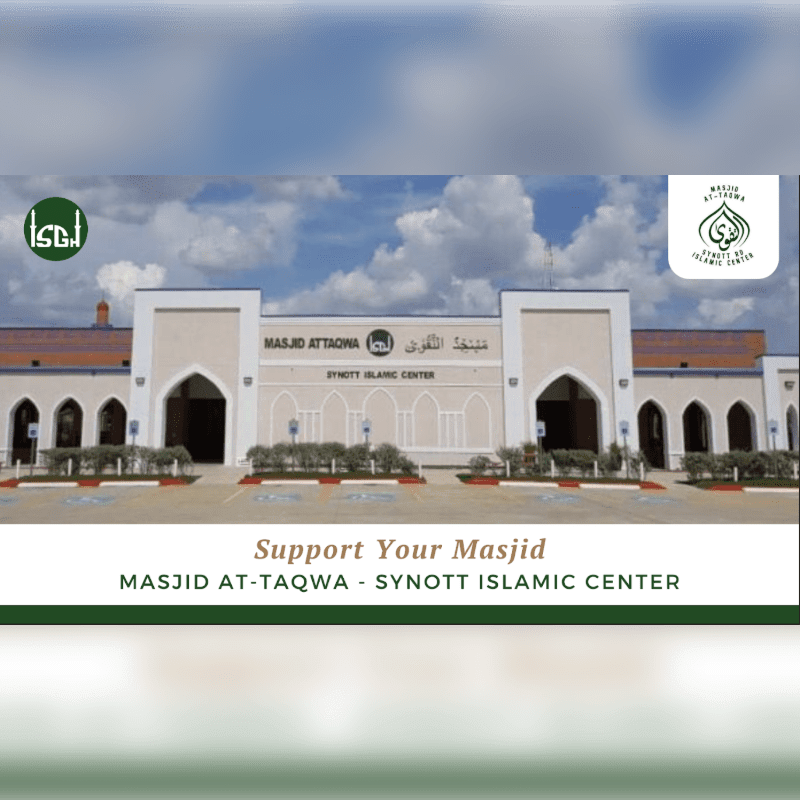 A modern Islamic center with a beige facade and arched windows stands under a cloudy sky, with a green grassy area in the foreground.