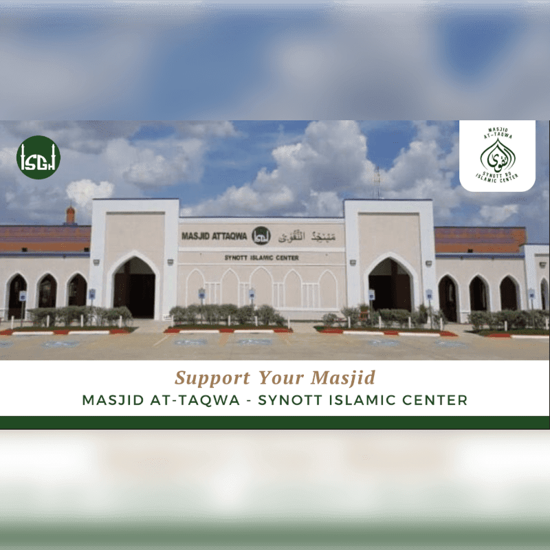A modern Islamic center with a beige facade and arched windows stands under a cloudy sky, with a green grassy area in the foreground.