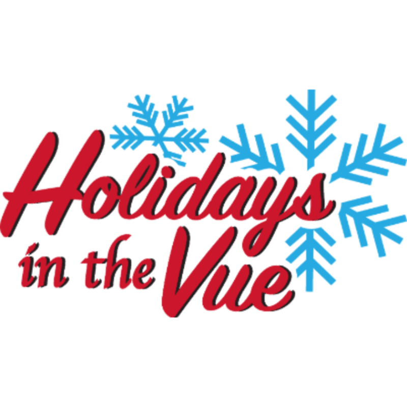 Red script lettering spelling "Holidays in the Vue" is superimposed over a white background with blue snowflake graphics.