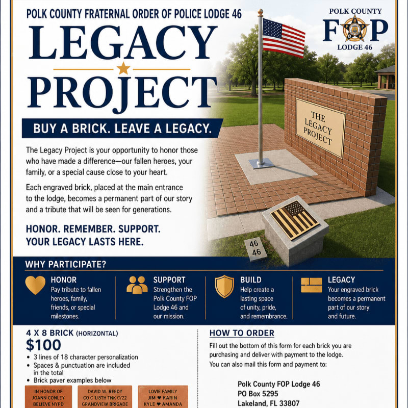 A brick memorial with an American flag stands in front of a lodge, with text detailing a "Legacy Project" in the foreground.