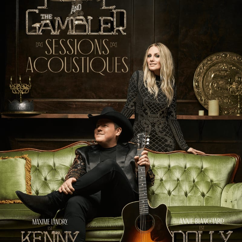 A man in a cowboy hat and a woman in a patterned dress sit on a green couch in front of a dark, ornate wall with a gold-embossed title.