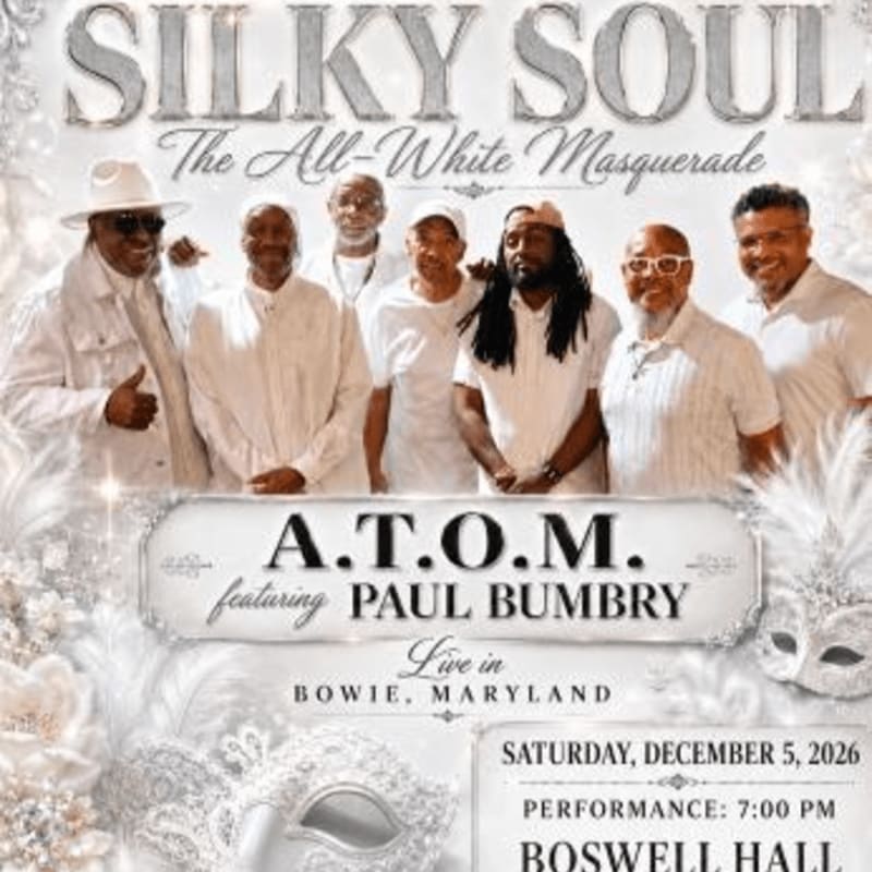 A group of men in white attire pose in the foreground, with decorative masks and text advertising a "Silky Soul" masquerade event in the background.