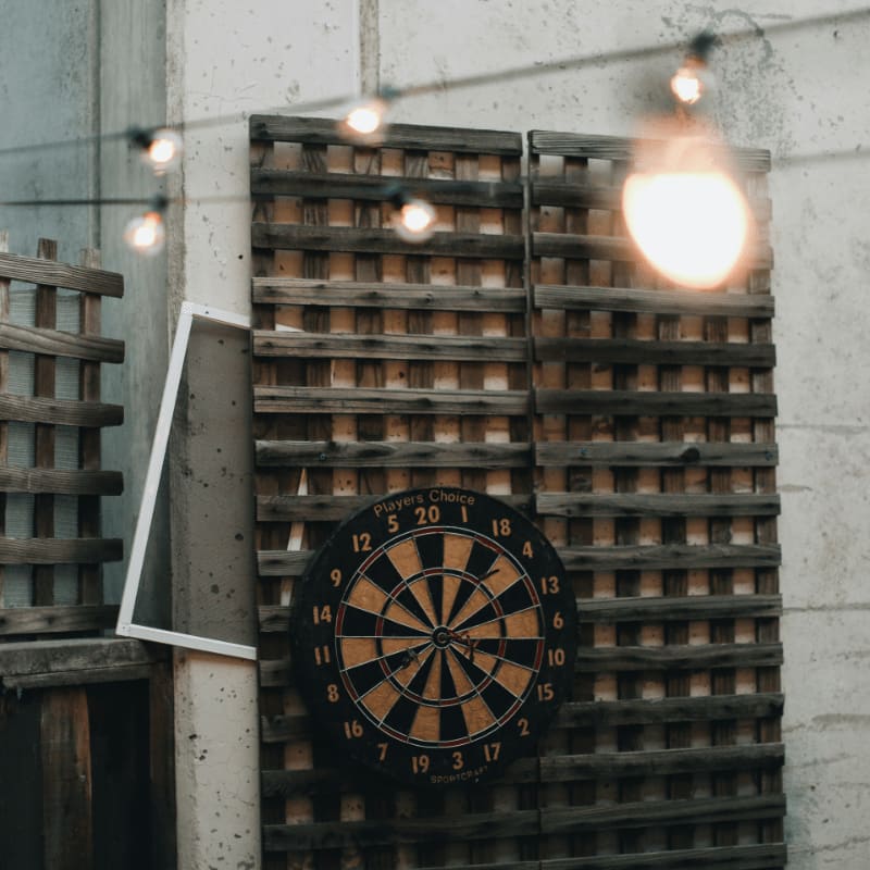black and white analog clock at 11 00