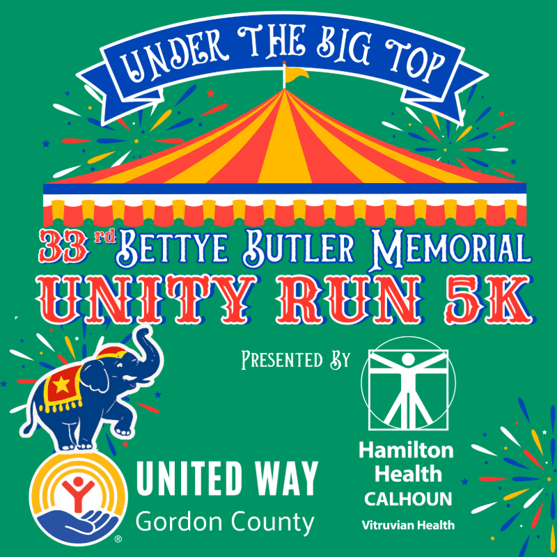 A colorful circus tent and an elephant are in the foreground, with the text "UNDER THE BIG TOP 33rd BETTYE BUTLER MEMORIAL UNITY RUN 5K" and sponsor logos in the background.