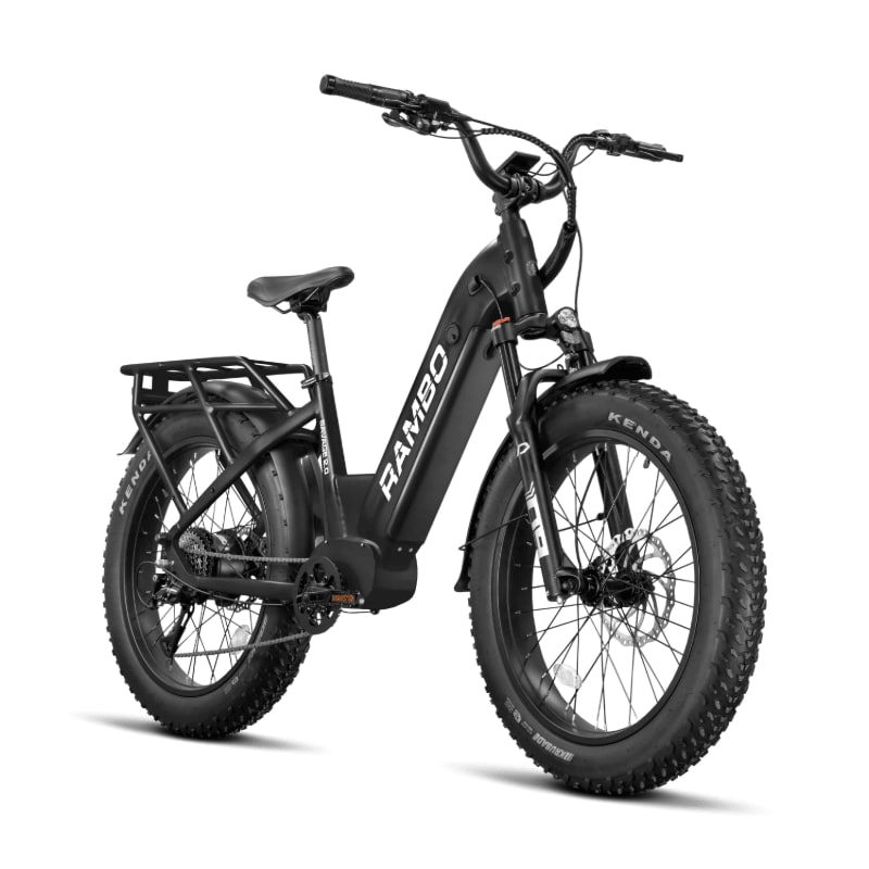 A black Rambo fat-tire electric bicycle with a rear rack stands against a plain white background.