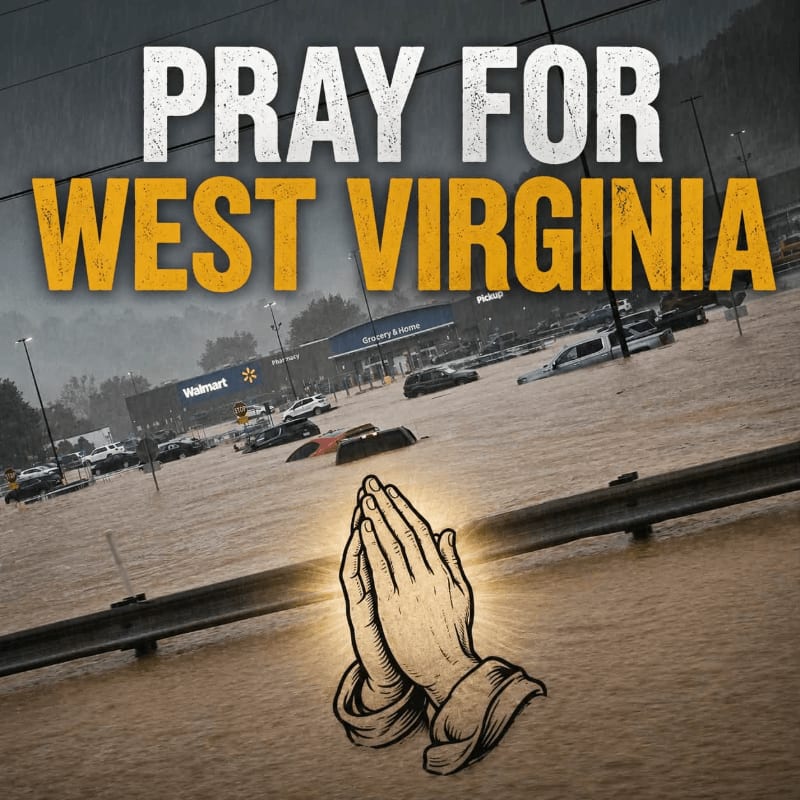 Praying hands are in the foreground with a flooded parking lot and Walmart in the background.