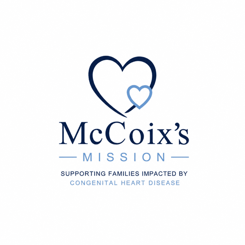 Two blue hearts, one larger than the other, are centered above the text "McCoix's MISSION" and "SUPPORTING FAMILIES IMPACTED BY CONGENITAL HEART DISEASE" on a white background.