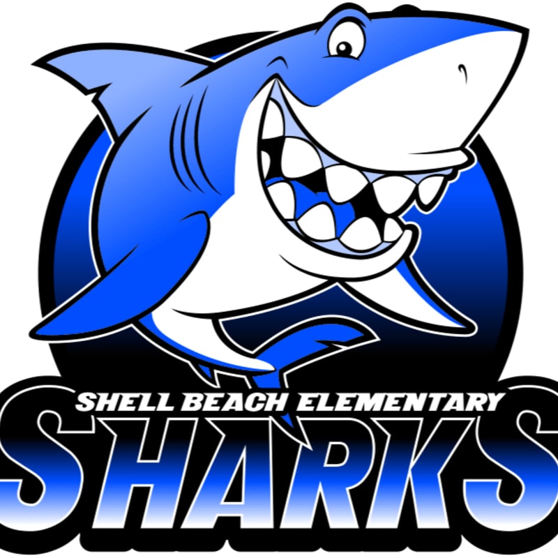 A cartoon shark with a wide grin and sharp teeth is featured in the foreground, with the words "SHELL BEACH ELEMENTARY SHARKS" in bold, stylized lettering below it against a plain white background.