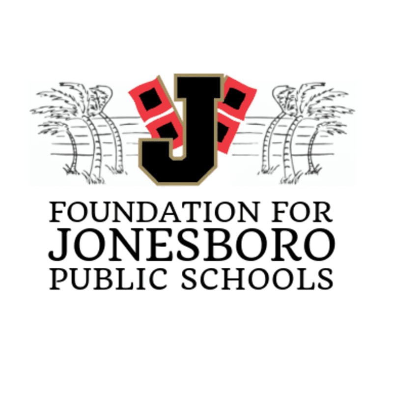 A large black letter "J" with red and white accents is centered behind two palm trees, with the words "FOUNDATION FOR JONESBORO PUBLIC SCHOOLS" below.