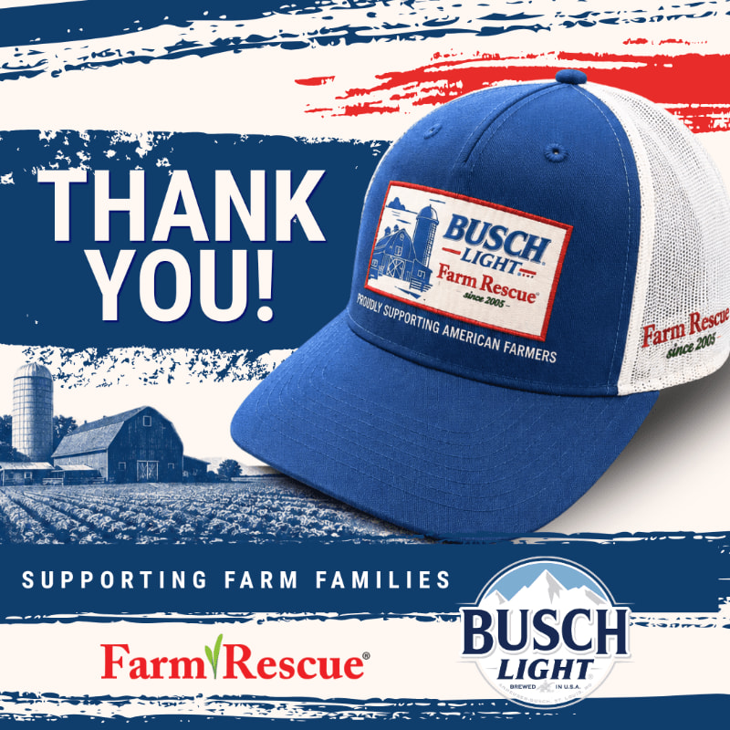 A blue Busch Light Farm Rescue trucker hat rests in the foreground against a background of a barn and fields, with a patriotic American flag motif.