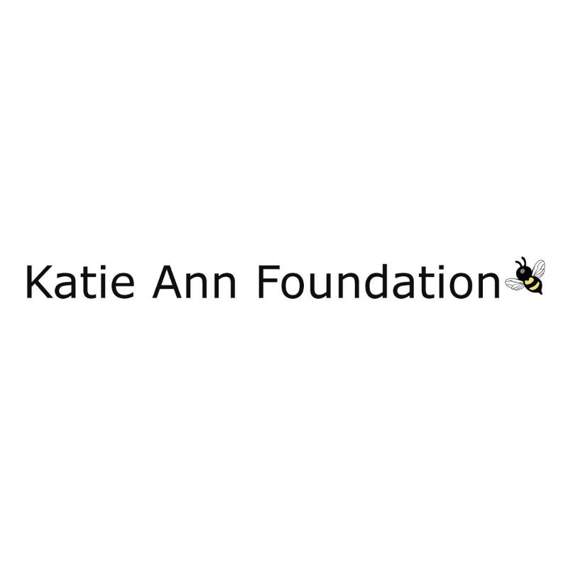 A black and yellow bee logo is positioned to the right of the text "Katie Ann Foundation" against a plain white background.