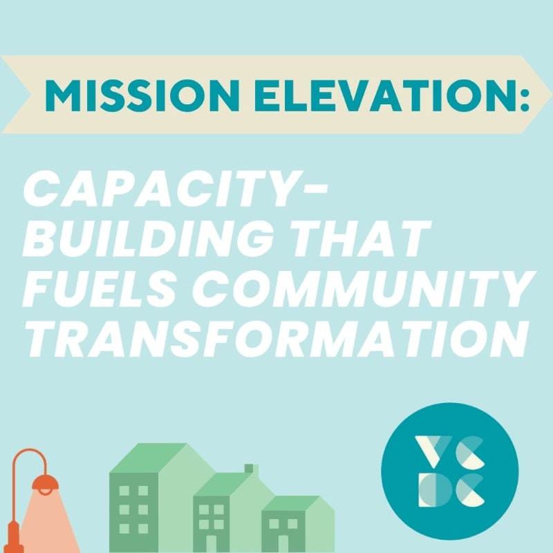 A light blue background features the text "MISSION ELEVATION: CAPACITY-BUILDING THAT FUELS COMMUNITY TRANSFORMATION" in white and teal, with a stylized streetlamp and green buildings in the foreground.