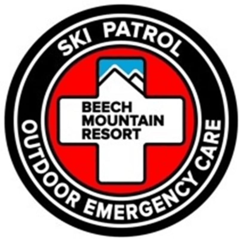 A white cross with "BEECH MOUNTAIN RESORT" in black text is superimposed on a red circle with a mountain graphic at the top, all enclosed within a black circle that reads "SKI PATROL OUTDOOR EMERGENCY CARE" in white text.