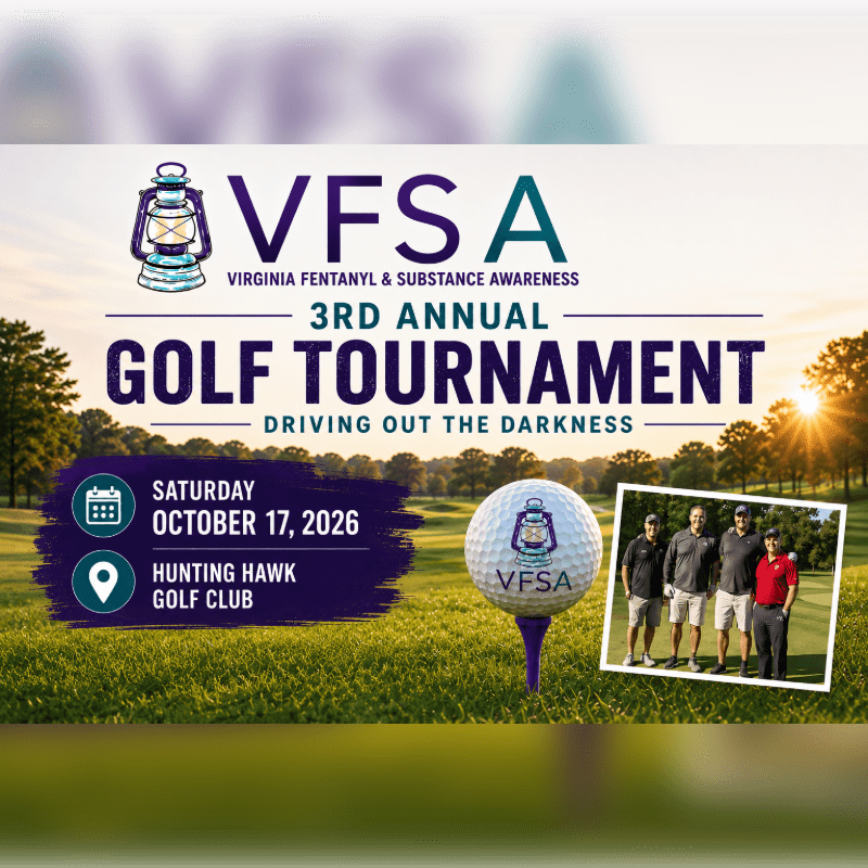 A golf ball with the VFSA logo sits on a tee in the foreground, with a group of golfers and event details on a purple banner against a backdrop of a golf course at sunset.