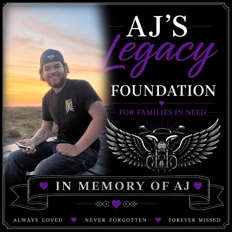 A young man sits outdoors in the foreground with a motorcycle and wings emblem and memorial text in the background.