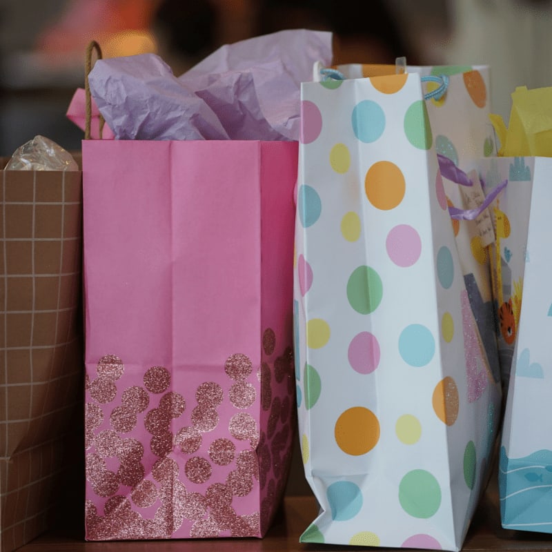 pink white and yellow polka dot paper bag