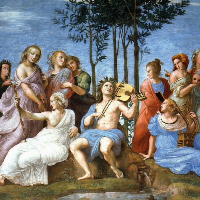 A group of women and a man playing a violin are gathered in a lush, green landscape with trees in the background.
