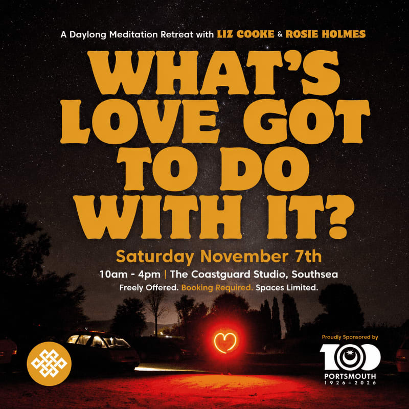 A neon heart glows in the foreground against a dark, starry night sky, advertising a meditation retreat in the background.