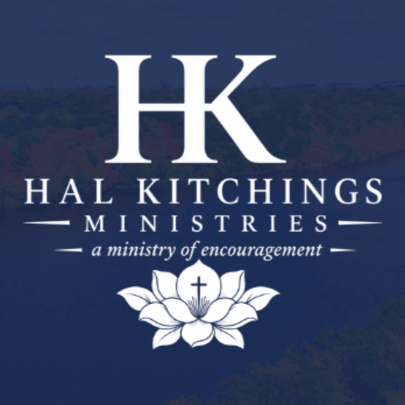 A white lotus flower with a cross inside rests on a dark blue background with the text "HAL KITCHINGS MINISTRIES - a ministry of encouragement" above it.