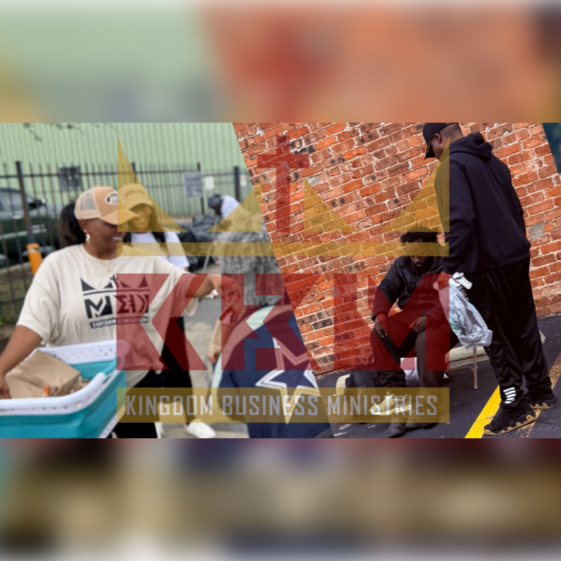 In the foreground, a woman in a tan hat and t-shirt smiles while reaching into a blue bin, and in the background, men sit near a brick wall with a large red cross overlay.