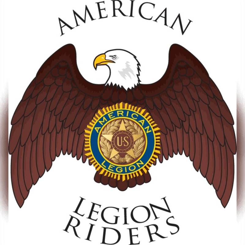 A bald eagle with outstretched wings, bearing the American Legion Riders emblem on its chest, is set against a white background.